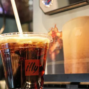 a cold beverage in a plastic cup