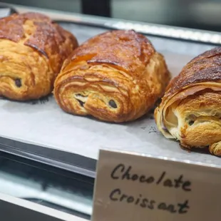 three croissants on a tray