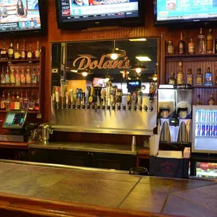a bar with beer taps