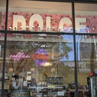 a reflection of a coffee shop