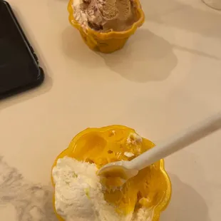 a bowl of ice cream with a spoon in it