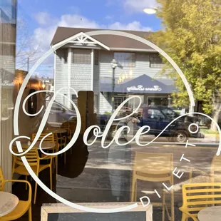 a view of a coffee shop through a window