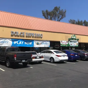 a row of cars in a parking lot