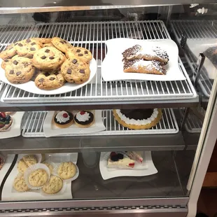 a display of pastries and desserts