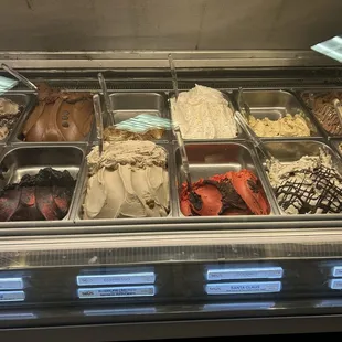 Counterclock: pista; coconut; espresso; choc sea salt truffle; (choc/chili); (roasted chestnuts); (red velvet cookie); PB choc chip