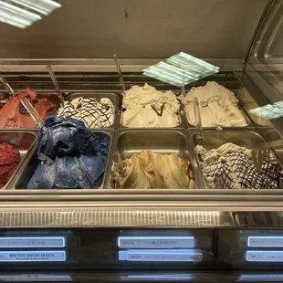 Top to bottom, R to L: banana cream, vanilla, chocolate chip, mint choc chip, salted maple caramel, snow miser (spirulina/pine/juniper)