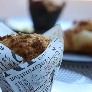 a muffin in a paper wrapper