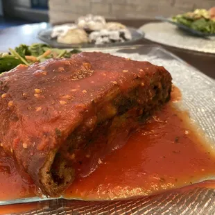 meatloaf with sauce and vegetables