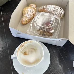 Aftermath of our breakfast. Lobster tail, cream filled croissant and tiramisu.