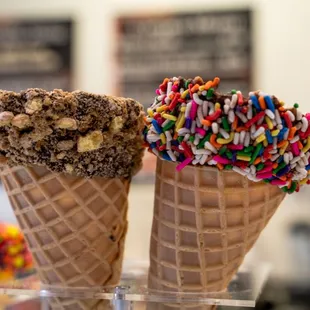 three cones of ice cream with sprinkles