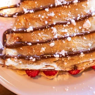 a stack of crepes on a plate