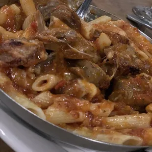 Generous serving of penne with Italian sausage baked in mozzarella.