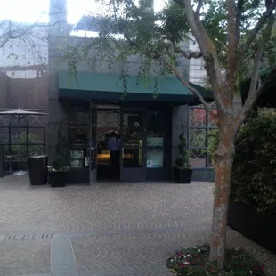 view of caffe with green awning
