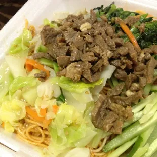 beef and vegetables in a styrofoam container