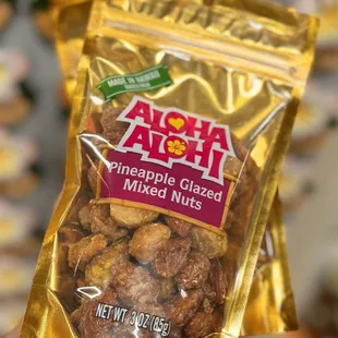 Pineapple glazed mixed nuts - $8, good!  Sold separately by a vendor within the Dole shop. They roast them on the spot.