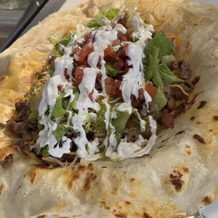 Mouth watering Carne Asada burrito with flavors that will make your mouth burst