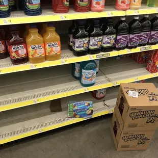 a variety of juices on shelves