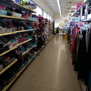 a view of a clothing store aisle