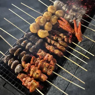 Chicken hearts, pork and beef isaw (intestine), kwek kwek, adidas (chicken feet), pork skin