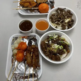 Assorted skewers, Pares Bowls (bottom right), Tapsilog bowl (top right)