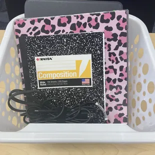 One small bin fits books and chrome book