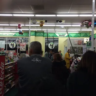 You think a company that could buy a competitor would be able to hire more help. One line open and six check outs. UNSAT