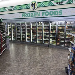 a frozen foods section in a grocery store