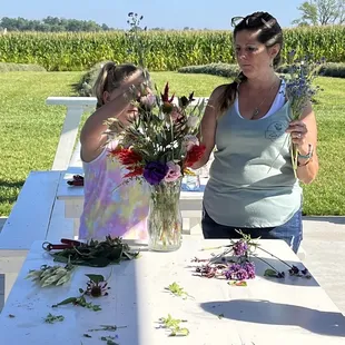 Learning how to make a beautiful flower arrangement.