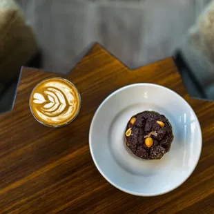 a cup of coffee and a doughnut