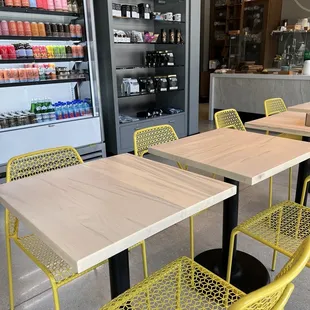 tables and chairs in a coffee shop