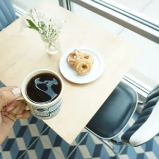 Metropolis coffee and house-made donuts and sunshine.