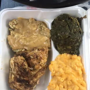 Chicken and dressing, mac n cheese, and greens