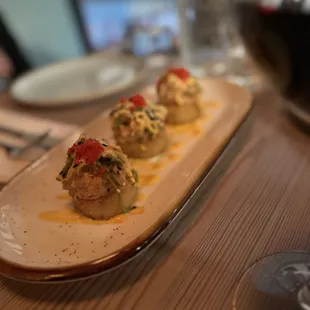 SALMON CRISPY RICE sushi rice, ayocado, jalapeño, sesame seeds, sriracha aioli