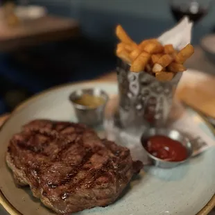 STEAK FRITES* 10 oz. steak, chimichurri sauce, fries