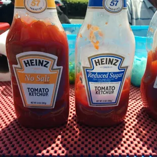 ketchup bottles on a table
