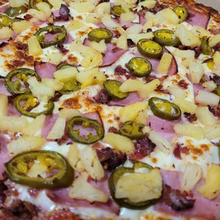 Ham, Bacon, Pineapple and Jalapeno Pizza.