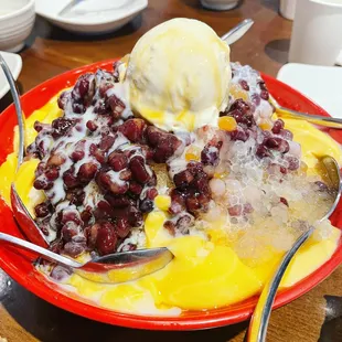 Giant bowl of shaved ice!!! Super friendly owner and staff!