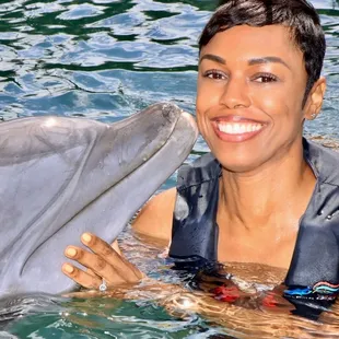 Me with my dolphin friend at dolphin quest.