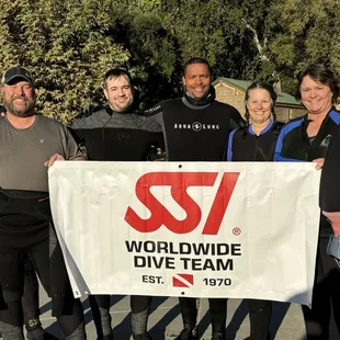 Two instructors left and right. Far left my Diving Buddy, me, Dave, two other open water female divers.