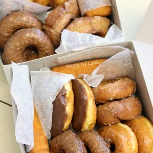Custard, glazed, chocolate covered, sour cream, and pumpkin glazed donuts ($26.20 for 20)