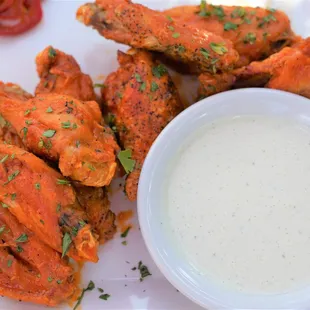 An order of buffalo wings contains 5 legs and 5 wings.