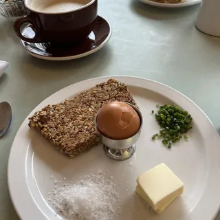 Six Minute Egg, Butter Chives on Housemade Seeded Bread