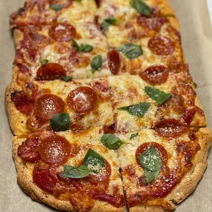 pepperoni and basil pizza