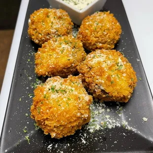 a plate of crab cakes