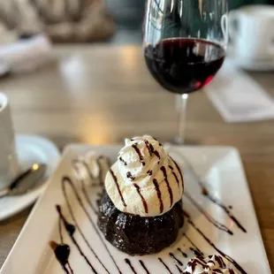 a dessert and a glass of wine