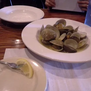 Little neck clams in drawn butter with a "mini-fork" for extracting.