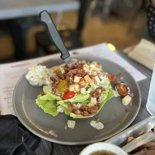 a plate of food and a cup of coffee
