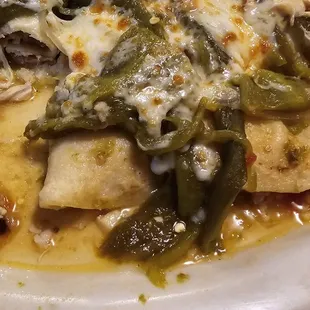 Super wet green enchiladas with flour tortillas. They were not good.