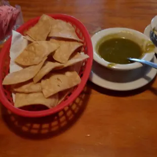 Chips and very savory greenish salsa? Very good, good spice.