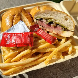 new york steak sandwich, chimichurri, provolone cheese, garlic fries